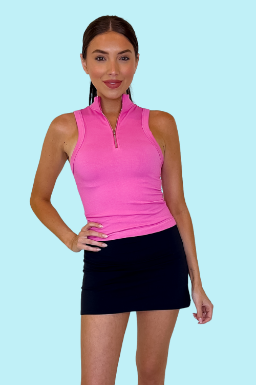 Ribbed athletic tank Fitted Bodice One Size fits most (XS-XL) Quarter zip neckline Model is wearing a small 92% Nylon, 8% Spandex