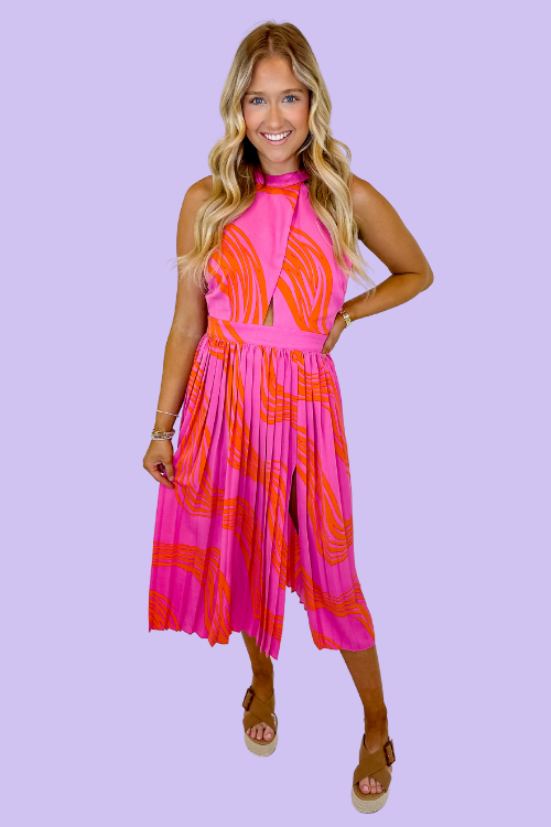 Pink and orange Crossed chest High halter neckline Keyhole open back Pleated bodice Front slit Lined 100% Polyester