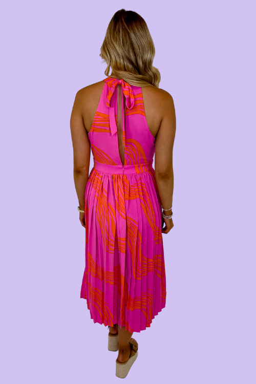 Pink and orange Crossed chest High halter neckline Keyhole open back Pleated bodice Front slit Lined 100% Polyester