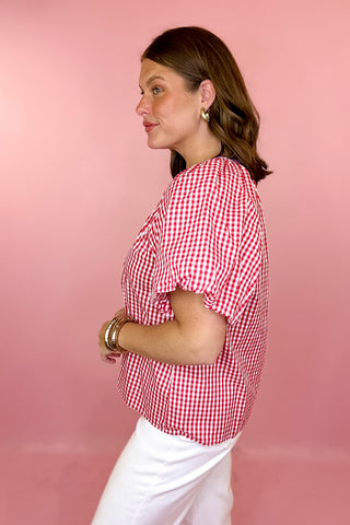 red and white checkered blouse with blue embroidery