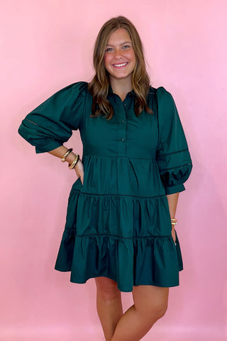 green tiered dress with lace trim