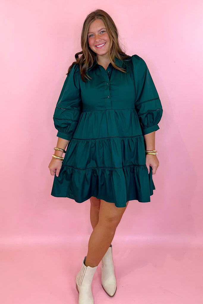 green tiered dress with lace trim