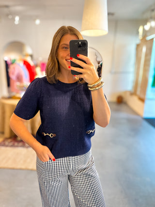 navy texture short sleeve sweater with horsebit detailing on front pockets