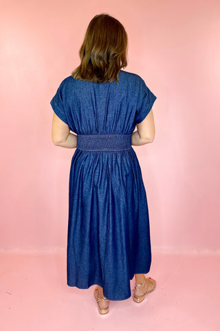 Dark blue denim dress with white embroidery