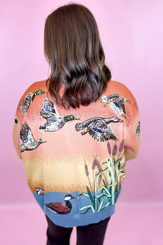 Queen Of Sparkles Ducks Flying Sunrise Sweater