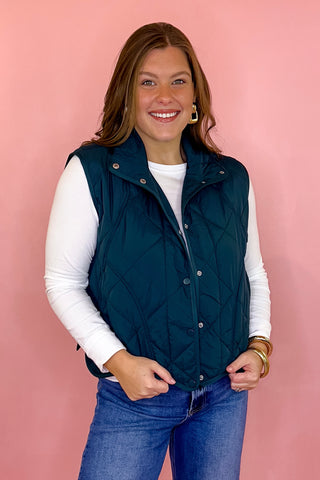 scalloped quilted vest