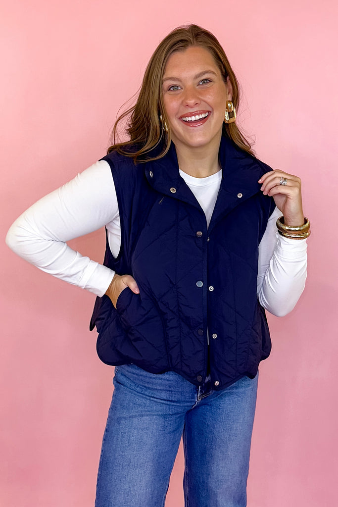 scalloped quilted vest