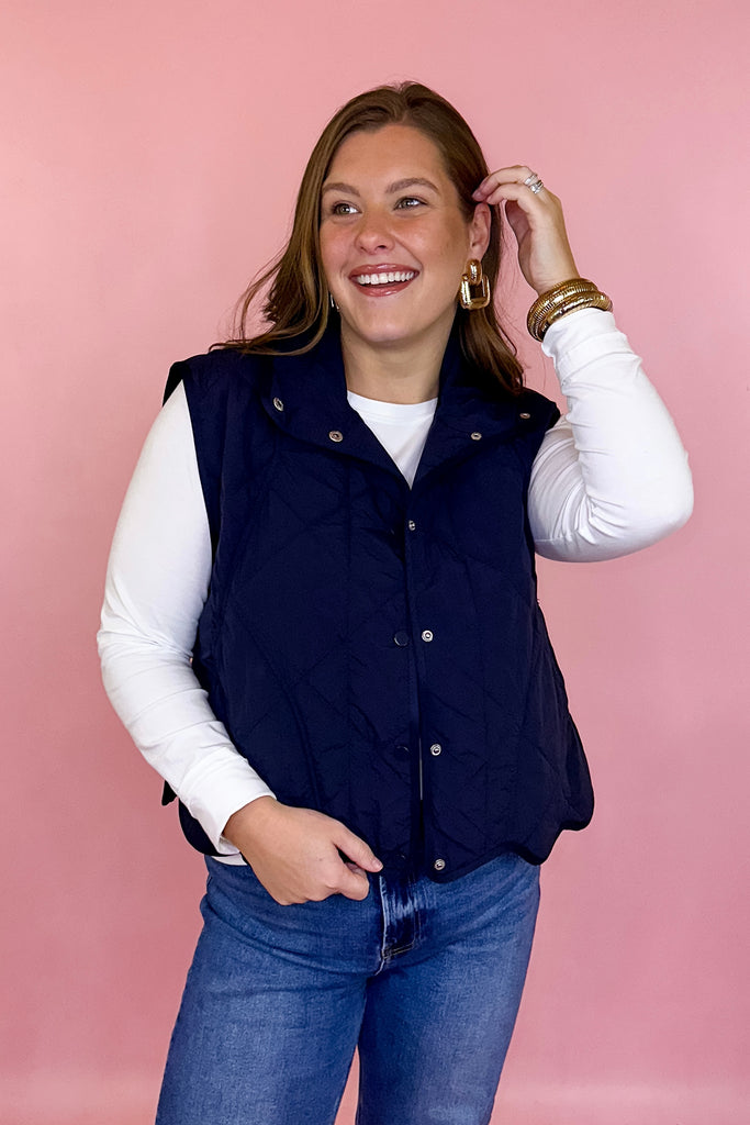 scalloped quilted vest