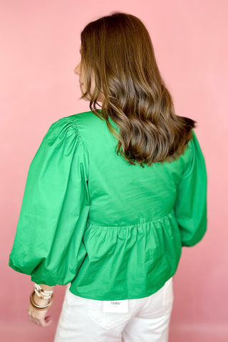 green peplum bow top