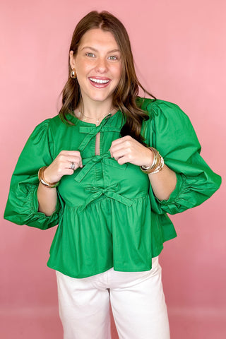 green peplum bow top