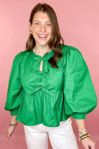 green peplum bow top