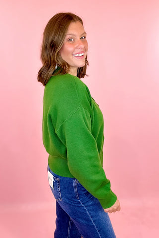 green cardigan