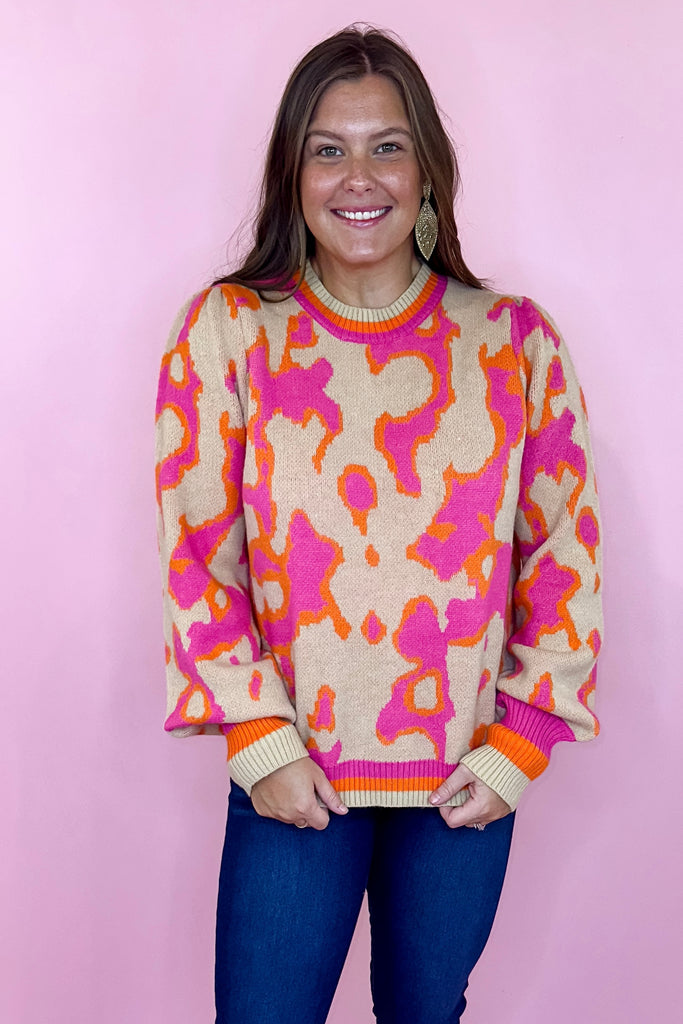 pink printed sweater