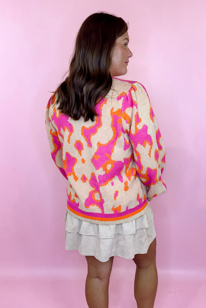 pink printed sweater