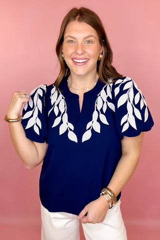 navy and white embroidered top