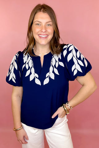 navy and white embroidered top