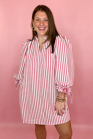 Red stripe dress with 3/4 sleeves and bow detailing coastal chic