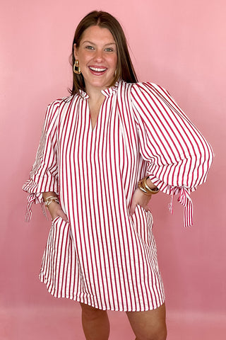 Red stripe dress with 3/4 sleeves and bow detailing coastal chic