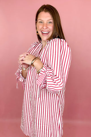 Red stripe dress with 3/4 sleeves and bow detailing coastal chic