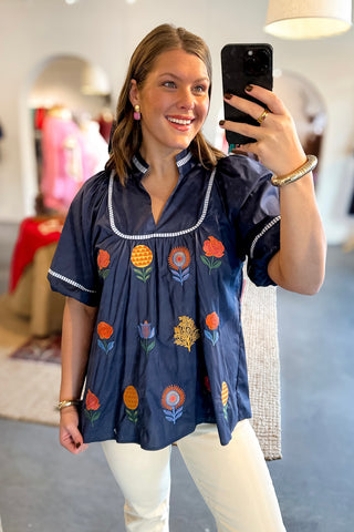 blue floral embroidered top