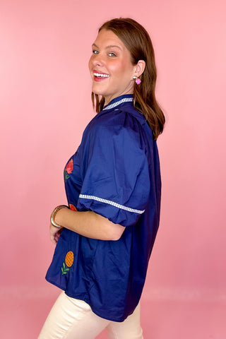 blue floral embroidered top