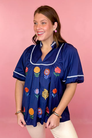 blue floral embroidered top